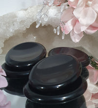 Load image into Gallery viewer, Worry Stone" Black Obsidian Crystal Carving Stone.

INSPIRES PROTECTION AND BALANCE
