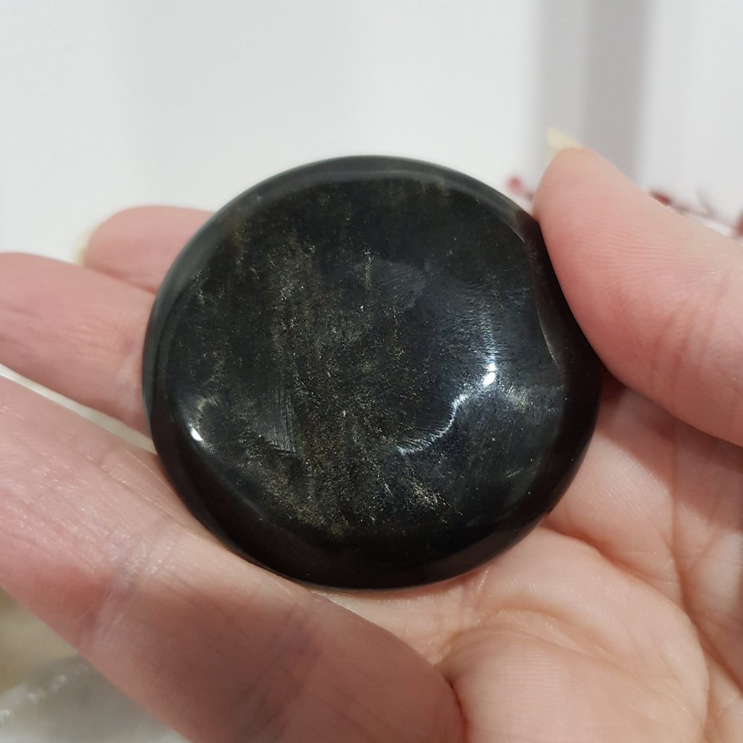 golden obsidian crystal palm stone