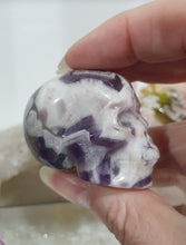 Load image into Gallery viewer, Skull Amethyst Chevron Crystal Carving Stone.

INSPIRES INTUITION &amp; SPIRITUALITY

Beautiful polished Amethyst Chevron Skull Crystal Carving Stone. 



