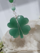 Load image into Gallery viewer, LUCKY FOUR-LEAF CLOVER BLESSINGS Aventurine Crystal Carving Silver Stone Crystal Energy Enhancer© / Hanger / Ornament / Suncatchers

GOOD FORTUNE | HOPE | MAGIC | PROTECTION

A four-leaf clover Symbolises good luck and abundance. It is believed if you hold a four-leaf clover you will gain the ability to see fairies and leprechauns and find their treasures.&nbsp;

Beautiful Aventurine four-leaf clover crystal carving beaded with Amazonite, Aventurine and Quartz. Wire wrapped in Silver
