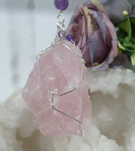 Load image into Gallery viewer, THE LOVE BOMB Rose Quartz Crystal Rough Silver Wired Crystal Energy Enhancer© Hanger Ornament Suncatcher. Inspires Unconditional Love, Harmony, Spirituality. Crystal Suncatchers
