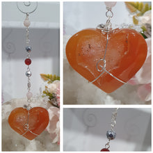 Load image into Gallery viewer, HEART OF LOVE &amp; SEDUCTION" -  - Carnelian Heart Silver Wired Stone Crystal Energy Enhancer© Hanger Suncatcher Ornament 200mm | Inspires Sensuality, Love &amp; Stability

INSPIRES SENSUALITY | LOVE | STABILITY 

Carnelian heart Crystal Energy Enhancer© / Hanger / Ornament beaded with Carnelian, Rose Quartz, Hematite, Herkimer Diamonds and quartz.  wired in silver
