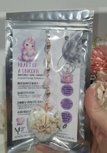 Load image into Gallery viewer, HEART OF A UNICORN" Aura Howlite Heart Stone Rose Gold Crystal Energy Enhancer© Hanger Ornament Suncatcher

INSPIRES MAGICK AND LOVE

Gorgeous Aura Howlite Heart beaded with Rose Quartz, Rainbow Hematite and Quartz. Wired in Rose Gold
