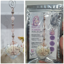 Load image into Gallery viewer, HEART OF A UNICORN" Aura Howlite Heart Stone Rose Gold Crystal Energy Enhancer© Hanger Ornament Suncatcher

INSPIRES MAGICK AND LOVE

Gorgeous Aura Howlite Heart beaded with Rose Quartz, Rainbow Hematite and Quartz. Wired in Rose Gold

