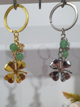 Load image into Gallery viewer, LUCKY FOUR LEAF CLOVER BLESSINGS" Metal Clover with Aventurine Beads Crystal Keyring 

Choose from Gold of Silver medal colour.

INSPIRES ABUNDANCE AND GOOD FORTUNE
