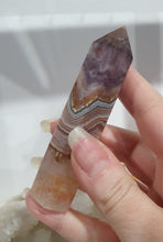 Load image into Gallery viewer, SECONDS STOCK - Amethyst Agate Crystal Point Tower Stone

THIS POINT IS A TAD WOBBLY

INSPIRES INTUITION AND WELLBEING

Amethyst Agate Tower Crystal Stone. is a little wobbly.  


