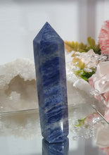 Load image into Gallery viewer, SECONDS STOCK  Sodalite Crystal Point Tower Stone

Inspires Self Esteem 

THIS POINT IS A BIT WOBBLY

Lovely Sodalite point tower.  its a tad wobbly


