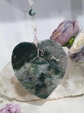 Load image into Gallery viewer, LEAF OF RENEWAL Moss Agate Leaf silver Crystal Energy Enhancer© Hanger Ornament Suncatcher, Inspires Spiritual Growth, Love &amp; Balance. Beaded with Moss Agate and Rose Quartz. Crystal Suncatchers
