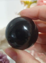 Load image into Gallery viewer, Black Obsidian Sphere Crystal Carving Stone on metal Silver Turtle Stand

Inspires Protection and balance
