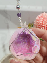 Load image into Gallery viewer, MAGICAL CRYSTAL CAVE - Handcrafted Titanium Aura Quartz Geode Crystal Energy Enhancer© / Hanger / Ornament / Suncatchers

DIVINE COMMUNICATION | HARMONY | MAGICK

Gorgeous Titanium Aura Quartz Geode crystal beaded with Rose Quartz, Amethyst and Rainbow Hematite. Wire wrapped in silver

Genuine Crystals. no plastic or glass. Ensuring energy flow throughout the enhancer.
