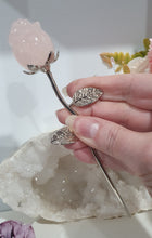 Load image into Gallery viewer, Rose Flower Rose Quartz Crystal Carving with silver stem.

Promotes Unconditional Love and Harmony

Beautiful Rose Quartz Flower / Rose Crystal Carving stone with silver stem and leaves.    
