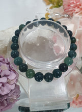 Load image into Gallery viewer, Forest Floor" Moss Agate Beaded Bracelet Crystal Gemstone Stone

7.5inch with 8mm beads. 

INSPIRES GROUNDING AND TRANSFORMATION 

Lovely Moss Agate Gemstone Beaded Bracelet.  Intuitively (Ramdomly) chosen.
