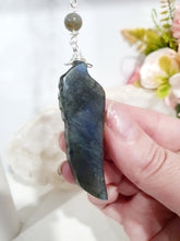Load image into Gallery viewer, Labradorite Feather Stone Silver Wired Crystal Energy Enhancer© / Hanger / Ornament / Sun Catcher

Inspires ANGELIC CONNECTION | STRENGTH | INTUITION

Gorgeous Labradorite feather stone crystal carving beaded with Labradorite and Moonstone. Wired in Silver
