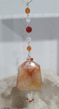 Load image into Gallery viewer, THE FIRE WITHIN" Handcrafted Fire Quartz Tower Crystal Carving Silver Crystal Energy Enhancer© Gemstone / Hanger / Suncatcher / Ornament 

STRENGTH | POWER | SPIRITUALITY

Beautiful Fire Quartz Tower Carving Crystal Energy Enhancer© / Sun Catcher / Ornament / Hanger beaded with Fire Quartz, Carnelian and Quartz.  wired in Silver
