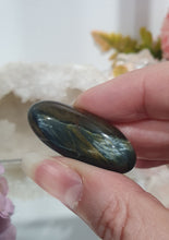 Load image into Gallery viewer, Blue Tigers Eye Crystal Tumble Stone

Inspires Courage

Gorgeous Blue Tigers Eye Crystal Tumble Stone. Absolutely stunning shine
