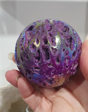 Load image into Gallery viewer, Pink Titanium Aura Sphalerite Sphere Crystal Carving on Silver Stand.

PROMOTES PSYCHIC DEVELOPMENT AND UPLIFTS

Absolutely Stunning Pink Titanium Aura Sphalerite Crystal Sphere on Silver Sand. The druzy on this in insane!. 
