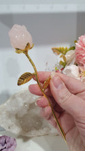 Load image into Gallery viewer, Rose Flower Rose Quartz Crystal Carving with gold stem.

Promotes Unconditional Love and Harmony

Beautiful Rose Quartz Flower / Rose Crystal Carving with gold stem and leaves.    
