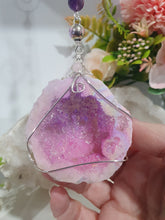 Load image into Gallery viewer, MAGICAL CRYSTAL CAVE - Handcrafted Titanium Aura Quartz Geode Crystal Energy Enhancer© / Hanger / Ornament / Suncatchers

DIVINE COMMUNICATION | HARMONY | MAGICK

Gorgeous Titanium Aura Quartz Geode crystal beaded with Rose Quartz, Amethyst and Rainbow Hematite. Wire wrapped in silver

Genuine Crystals. no plastic or glass. Ensuring energy flow throughout the enhancer.
