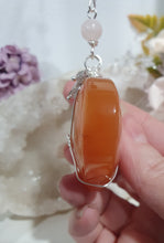 Load image into Gallery viewer, HEART OF LOVE &amp; SEDUCTION" -  - Carnelian Heart Silver Wired Stone Crystal Energy Enhancer© Hanger Suncatcher Ornament 200mm | Inspires Sensuality, Love &amp; Stability

INSPIRES SENSUALITY | LOVE | STABILITY 

Carnelian heart Crystal Energy Enhancer© / Hanger / Ornament beaded with Carnelian, Rose Quartz, Hematite, Herkimer Diamonds and quartz.  wired in silver
