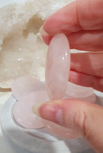 Load image into Gallery viewer, Worry Stone" Rose Quartz Crystal Carving Stone.

INSPIRES UNCONDITIONAL LOVE &amp; HARMONY

What is a worry Stone? Perfectly shaped for your thumb, this crystal worry stone connects you to positive energy. Rubbing its smooth surface allows it to act as a powerful vessel for emotional release from anxiety and stress.

Lovely Rose Quartz crystal worry stone crystal carving.  Pop in your bag and keep with you to alleviate stress. Intuitively ( Randomly) chosen.


