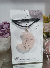 Load image into Gallery viewer, Rose Quartz Moon Crystal Pendant Wire Wrapped Silver Stone with black cord chain

INSPIRES UNCONDITIONAL LOVE &amp; HARMONY

Beautiful Rose Quartz Moon Crystal Carving Wire Wrapper in Silver non tarnish wire. Accompanied by a black cord necklace


