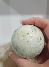 Load image into Gallery viewer, Phoenix Stone Sphere Crystal Carving Stone on Silver Stand

Inspires Compassion

Lovely Phoenix Stone Crystal Sphere Carving Stone on silver stand.  
