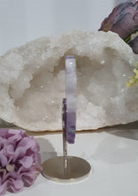 Load image into Gallery viewer, Lovely Amethyst Heart Flower Crystal Carving on silver stand. Gorgeous little statement piece.  Great Crystal Gift Idea. Inspires Intuition and spirituality
