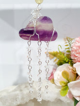 Load image into Gallery viewer, Lovely "EVERY CLOUD HAS A SILVER LINING" Fluorite Cloud silver wired Crystal Energy Enhancer© Hanger Ornament Suncatcher.

From Darkness comes Light.

TRANSFORMATION / INTUITION / SPIRITUALITY

Beautiful Fluorite Cloud Crystal Carving beaded with Fluorite &amp; Quartz. wired in Silver
