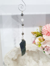 Load image into Gallery viewer, Labradorite Feather Stone Silver Wired Crystal Energy Enhancer© / Hanger / Ornament / Sun Catcher

Inspires ANGELIC CONNECTION | STRENGTH | INTUITION

Gorgeous Labradorite feather stone crystal carving beaded with Labradorite and Moonstone. Wired in Silver
