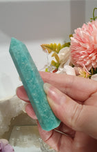 Load image into Gallery viewer, Amazonite Crystal Point Tower Stone.  Shes a tad wobbly.

INSPIRES HOPE

Lovely Amazonite crystal point tower. Discounted as a little bit wobbly but still a lovely tower
