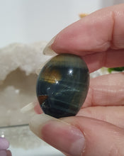Load image into Gallery viewer, Blue Tigers Eye Crystal Tumble Stone 

Inspires Courage

Gorgeous Blue Tigers Eye Crystal Tumble Stone. Lovely shine
