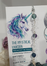Load image into Gallery viewer, THE MYSTICAL UNICORN" Handcrafted Fluorite Unicorn Crystal Carving Silver Crystal Energy Enhancer© Gemstone / Hanger / Suncatcher / Ornament

PURITY | STRENGTH | MAGIC

Beautiful Fluorite Unicorn Carving Crystal Energy Enhancer© / Sun Catcher / Ornament / Hanger beaded with Fluorite and Quartz.  wired in Silver
