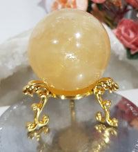 Load image into Gallery viewer, Honey-Calcite-Sphere-on-Stand-Crystal-Stone-Moonlight-Crystals-Australia
