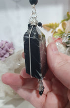 Load image into Gallery viewer, LIGHT THROUGH DARKNESS" Handcrafted Black Agate Tower Crystal Carving Silver Crystal Energy Enhancer© Gemstone / Hanger / Suncatcher / Ornament 

STRENGTH | COURAGE | CLARITY

Beautiful Black Agate Tower Carving Crystal Energy Enhancer© / Sun Catcher / Ornament / Hanger beaded with Black Agate, Quartz and Herkimer Diamonds.  wired in Silver

G
