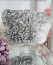 Load image into Gallery viewer, Apophyllite Crystal Cluster Specimen Stone on plastic Stand 

Promotes Divine Guidance

Lovely Apophyllite crystal cluster on plastic stand. Has tiny crystals poking out of it.  The photos just don't pick up the lovely sparkles. 
