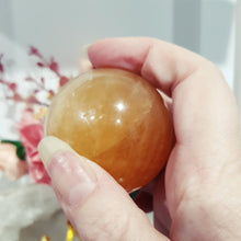 Load image into Gallery viewer, honey-calcite-sphere-crystal-carving
