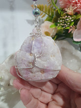 Load image into Gallery viewer, MAGICAL CRYSTAL CAVE - Handcrafted Titanium Aura Quartz Geode Crystal Energy Enhancer© / Hanger / Ornament / Suncatchers

DIVINE COMMUNICATION | HARMONY | MAGICK

Gorgeous Titanium Aura Quartz Geode crystal beaded with Rose Quartz, Amethyst and Rainbow Hematite. Wire wrapped in silver

Genuine Crystals. no plastic or glass. Ensuring energy flow throughout the enhancer.
