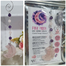 Load image into Gallery viewer, THE PINK MOON" Handcrafted Rose Quartz Moon Carving Stone Silver Crystal Energy Enhancer© Hanger Ornament Suncatcher 

INSPIRES LOVE | HARMONY | GROWTH

Beautiful Rose Quartz Moon Crystal Carving beaded with Rose Quartz and Amethyst. wired in silver
