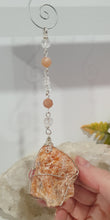 Load image into Gallery viewer, EMPOWERED BY THE SUN" Handcrafted Sunstone Raw Crystal Carving Silver Crystal Energy Enhancer© Hanger Ornament Suncatcher 

Inspires EMPOWERMENT | JOY | COURAGE

Lovely Sunstone rough crystal stone beaded with Sunstone and Quartz.  Wire wrapped in silver
