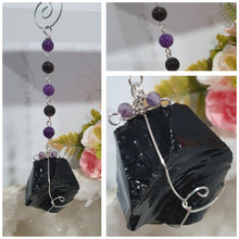 Load image into Gallery viewer, WITCHES AMULET - Handcrafted Obsidian Stone Crystal Energy Enhancer© / Hanger / Ornament / Suncatcher 

INSPIRES PROTECTION AND INTUITION

Gorgeous Obsidian raw crystal stone beaded with Black Obsidian and Amethyst. Wire wrapped in silver
