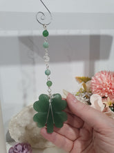 Load image into Gallery viewer, LUCKY FOUR-LEAF CLOVER BLESSINGS" Handcrafted Aventurine Crystal Carving Silver Stone Crystal Energy Enhancer© / Hanger / Ornament / Suncatcher 

Promotes GOOD FORTUNE | HOPE | MAGIC | PROTECTION

A four-leaf clover Symbolises good luck and abundance. It is believed if you hold a four-leaf clover you will gain the ability to see fairies and leprechauns and find their treasures. 

Beautiful Aventurine four-leaf clover crystal carving beaded with Amazonite, Aventurine and Quartz. Wire wrapped in Silver. 

