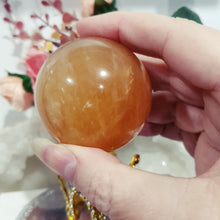 Load image into Gallery viewer, honey-calcite-sphere-crystal-carving

