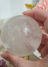 Load image into Gallery viewer, Quartz Sphere Crystal Carving Stone on Silver Stand

Inspires Magick, Purity &amp; Spirituality

Stunning Quartz Crystal Sphere Carving Stone on silver stand.  A must for any crystal collector

