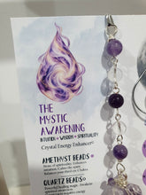 Load image into Gallery viewer, THE MYSTIC AWAKENING" Handcrafted Amethyst Raw Crystal Stone Silver Crystal Energy Enhancer© Hanger Ornament Suncatcher

INSPIRES INTUITION, WISDOM AND SPIRITUALITY

Stunning Raw Amethyst crystal stone beaded with Amethyst and Quartz. Wire wrapped in silver

