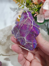 Load image into Gallery viewer, ENCHANTED AURA - Handcrafted Titanium Aura Quartz Crystal Energy Enhancer© / Hanger / Ornament / Suncatchers

EMPOWERMENT | PROTECTION | MAGICK

Gorgeous handcrafted Titanium Aura Quartz crystal beaded with Rainbow Hematite and Hematite. Wire wrapped in silver

Genuine Crystals. no plastic or glass. Ensuring energy flow throughout the enhancer.
