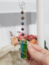 Load image into Gallery viewer, LIGHTSABER ENERGY FORCE - INTENT / GROUNDS / PROTECTION - Titanium Aura Quartz Point Silver wired Stone Crystal Silver Energy Enhancer© / Hanger / Ornament / Sun catcher 180mm
