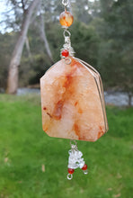 Load image into Gallery viewer, THE FIRE WITHIN" Handcrafted Fire Quartz Tower Crystal Carving Silver Crystal Energy Enhancer© Gemstone / Hanger / Suncatcher / Ornament 

STRENGTH | POWER | SPIRITUALITY

Beautiful Fire Quartz Tower Carving Crystal Energy Enhancer© / Sun Catcher / Ornament / Hanger beaded with Fire Quartz, Carnelian and Quartz.  wired in Silver
