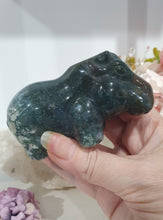Load image into Gallery viewer, Hippopotamus Hippo Moss Agate Crystal Carving Stone

INSPIRES GROUNDING AND CONNECTION TO EARTH

Beautiful Moss Agate Hippo Crystal Carving Stone.  Amazing Piece!.     

