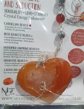 Load image into Gallery viewer, "HEART OF LOVE &amp; SEDUCTION" -  - Carnelian Heart Silver Wired Stone Crystal Energy Enhancer© Hanger Suncatcher Ornament 200mm | Inspires Sensuality, Love &amp; Stability
