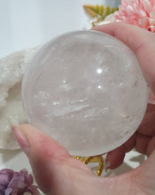 Load image into Gallery viewer, Quartz Sphere Crystal Carving Stone on Silver Stand

Inspires Magick, Purity &amp; Spirituality

Stunning Quartz Crystal Sphere Carving Stone on silver stand.  A must for any crystal collector
